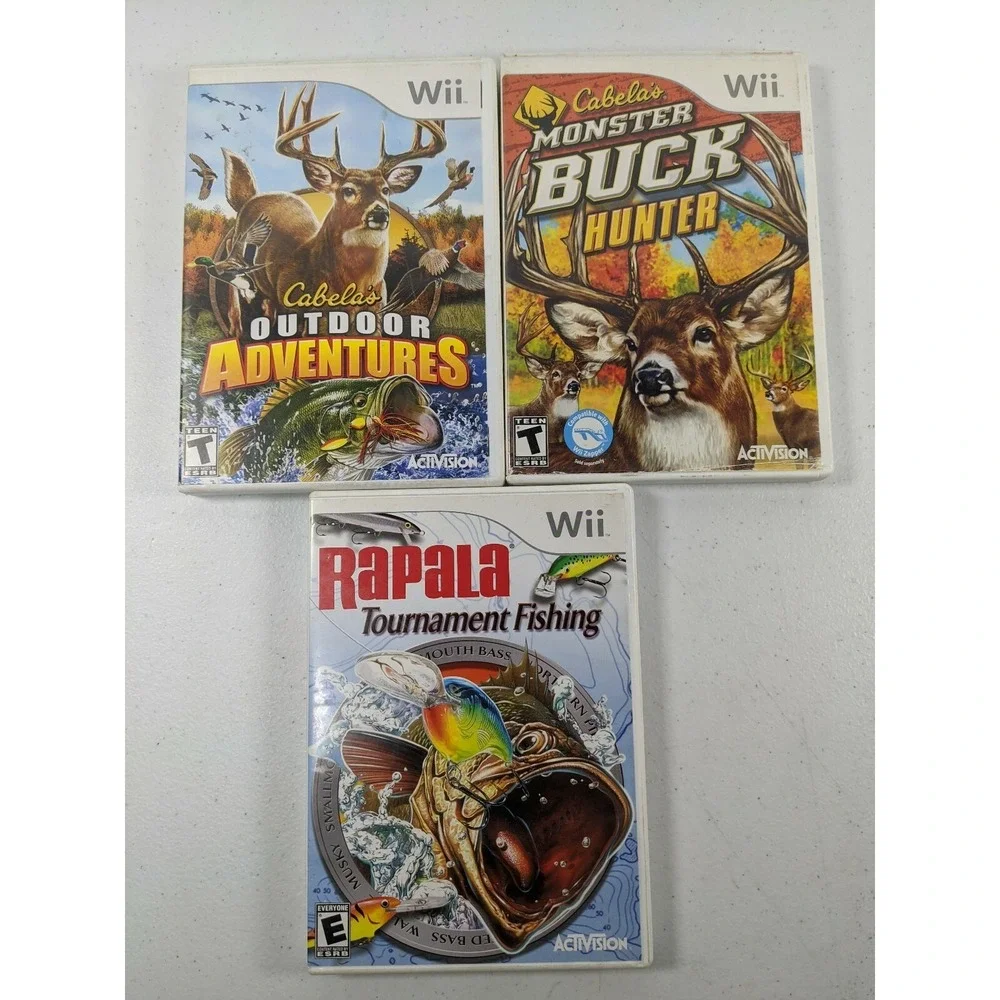 3 Wii games Rapala Tournament Fishing & Monster Buck Hunter & Outdoor Adventures